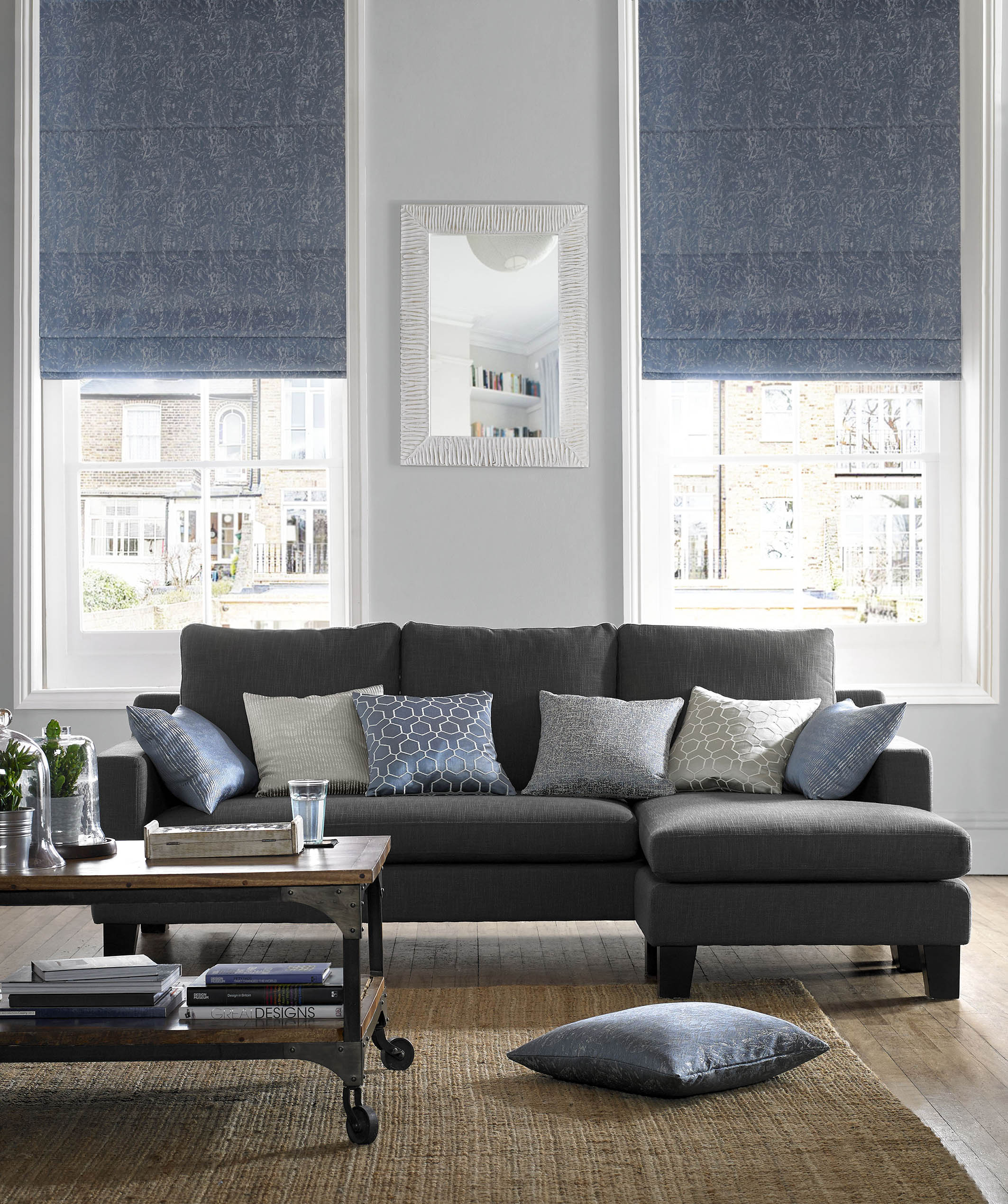 Made to measure blind framed by curtains